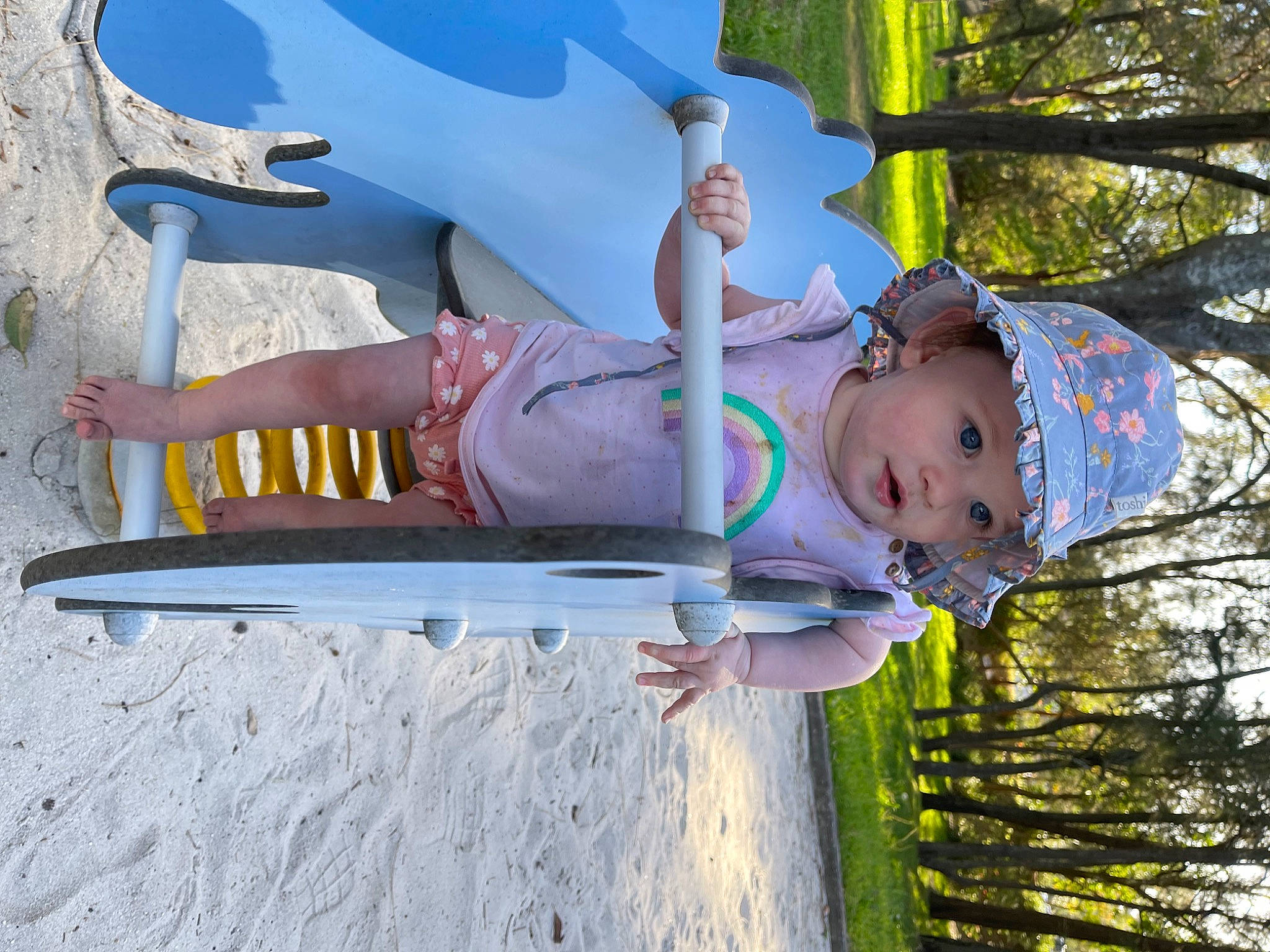 Kyah joined the competition — help win amazing prizes! baby, baby_toddler_clothing, child, city, fun, happy, headwear, leisure, mammal, outdoor_play_equipment, person, plant, playground, playground_slide, product, recreation, smile, toddler, tree, water
