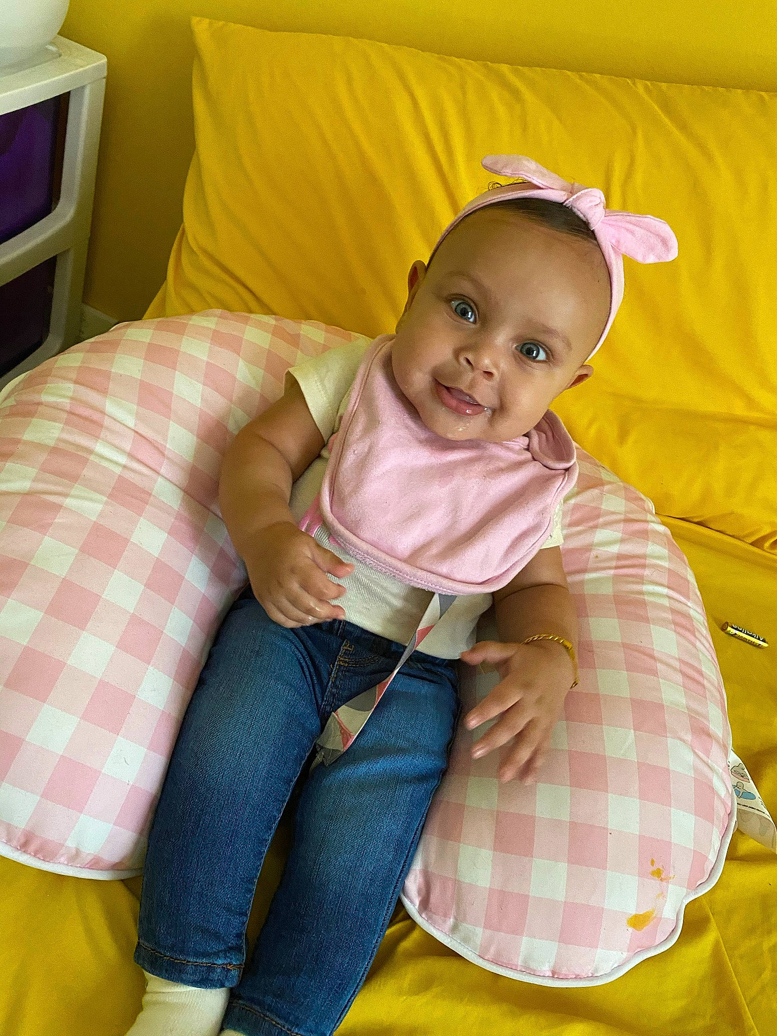 Lakyn is registered to the contest to win money with this photo: analog_television, baby, baby_toddler_clothing, bedroom, comfort, ear, hair_accessory, headband, headpiece, home_accessories, joy, lamp, lap, linens, person, pillow, plaid, sock, tartan, television