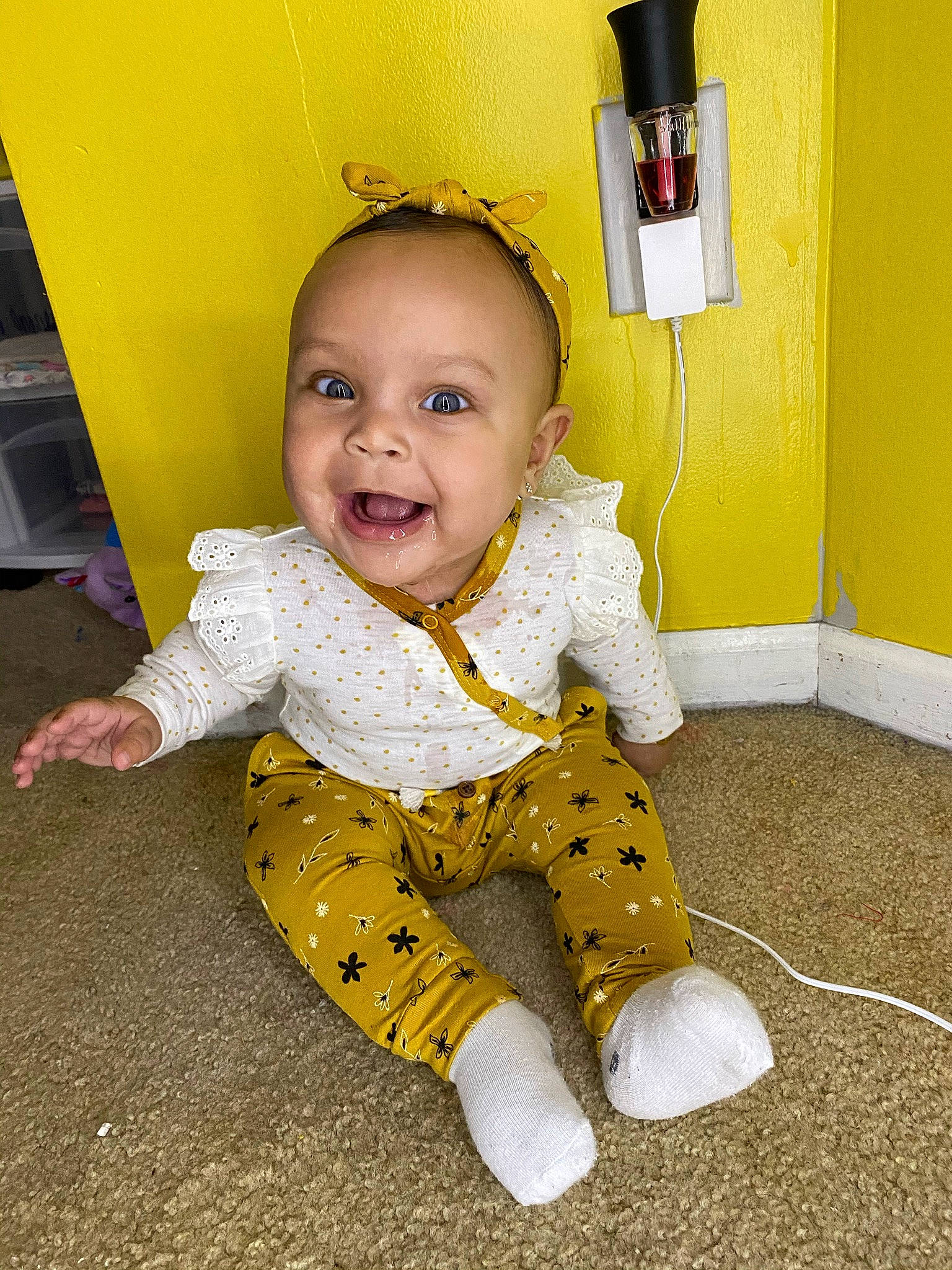 Lakyn joined the competition — help win amazing prizes! baby, baby_crawling, baby_laughing, baby_toddler_clothing, cheek, child, corded_phone, crawling, floor, flooring, joy, lamp, nightwear, overall, person, toddler, tongue, yellow