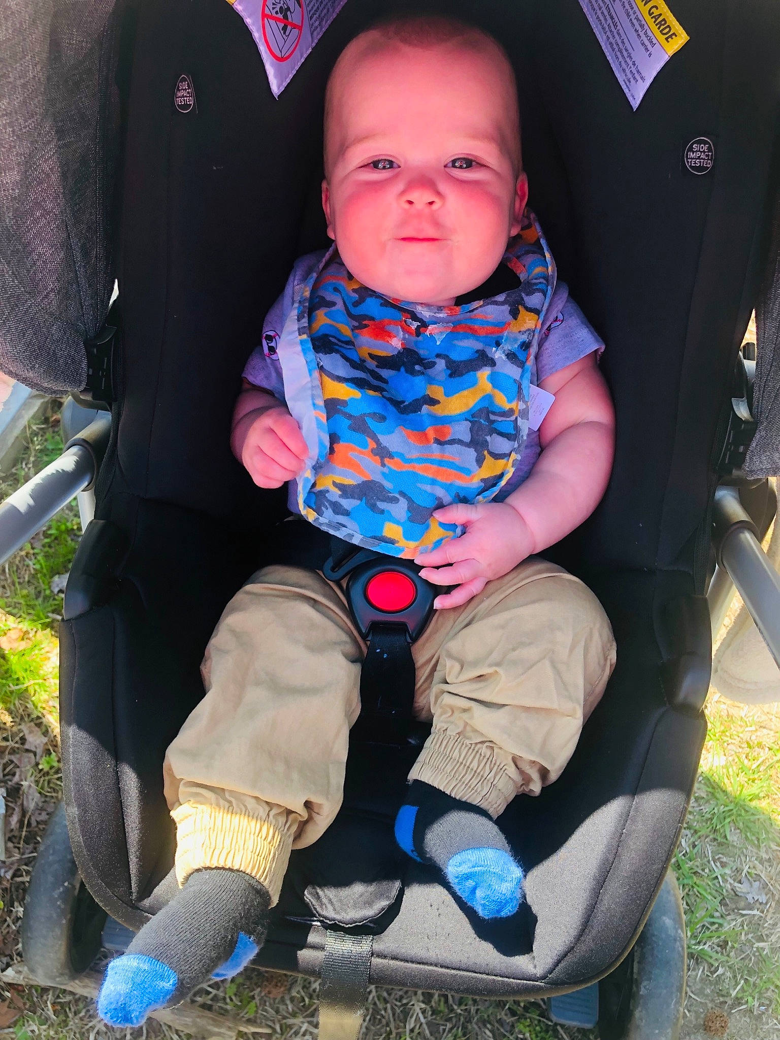 Adan is registered to the contest to win money with this photo: baby, baby_carriage, baby_in_car_seat, baby_products, car_seat, child, cool, grass, person, product, shoe, sitting, skin, smile, toddler, vacation