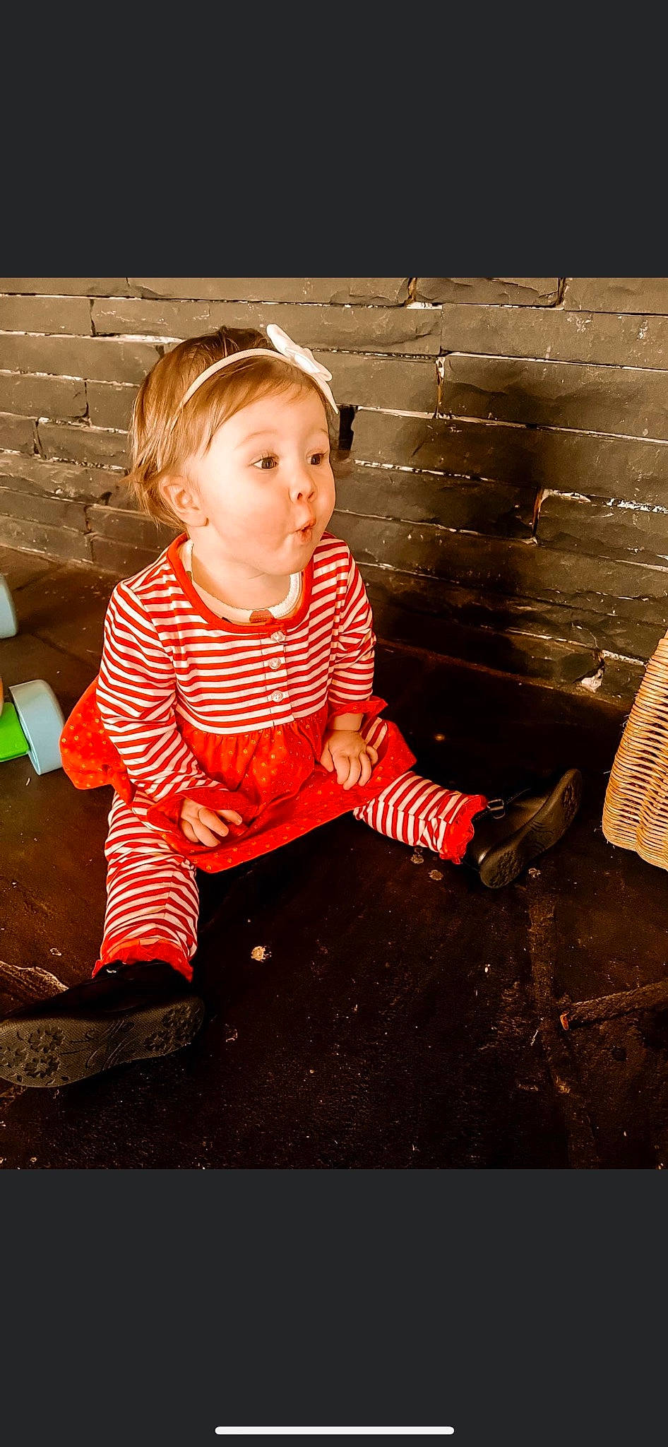 Averie is registered to the contest to win money with this photo: baby_toddler_clothing, carmine, cheek, child, eye, flash_photography, flooring, fun, happy, head, pattern, people_in_nature, person, portrait, portrait_photography, sitting, sleeve, t_shirt, tints_and_shades, toddler