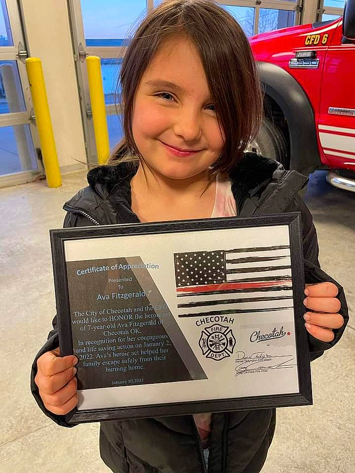 Ava is registered to the contest to win money with this photo: automotive_lighting, automotive_tire, bumper, car, chair, child, family_car, joy, motor_vehicle, parking, person, personal_luxury_car, photograph, reading, sitting, smile, snapshot, tire, vehicle, vehicle_door