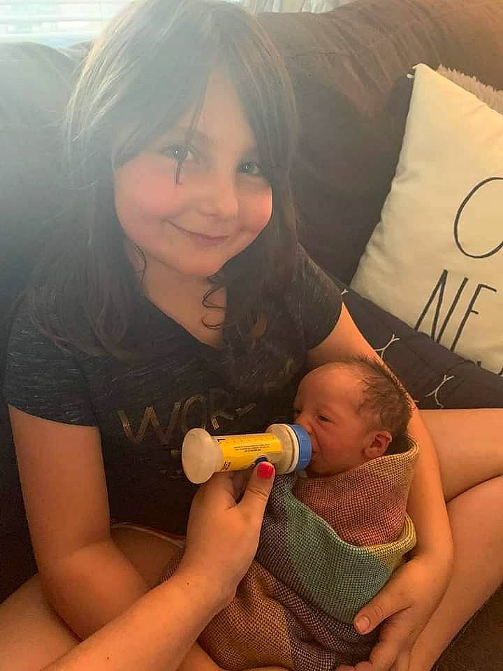 Ava is registered to the contest to win money with this photo: arm, eyebrow, eyelash, face, facial_expression, hair, hand, head, human_body, joint, joy, leg, lip, mouth, muscle, neck, nose, organ, person, shoulder