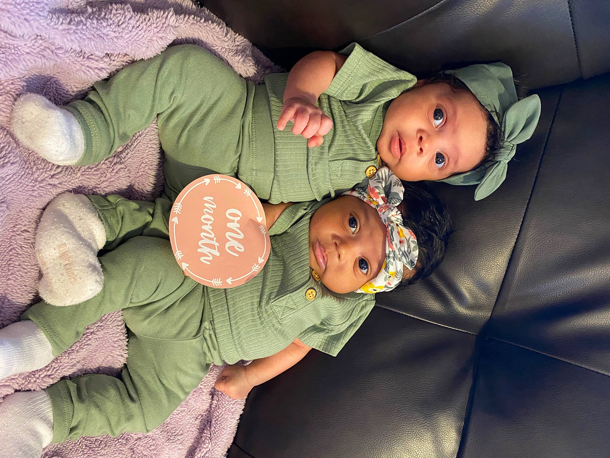 England joined the competition — help win amazing prizes! baby, baby_products, baby_sleeping, baby_toddler_clothing, bedtime, cheek, child, comfort, eye, green, happy, headwear, interaction, lap, mammal, nap, person, sitting, textile, toddler