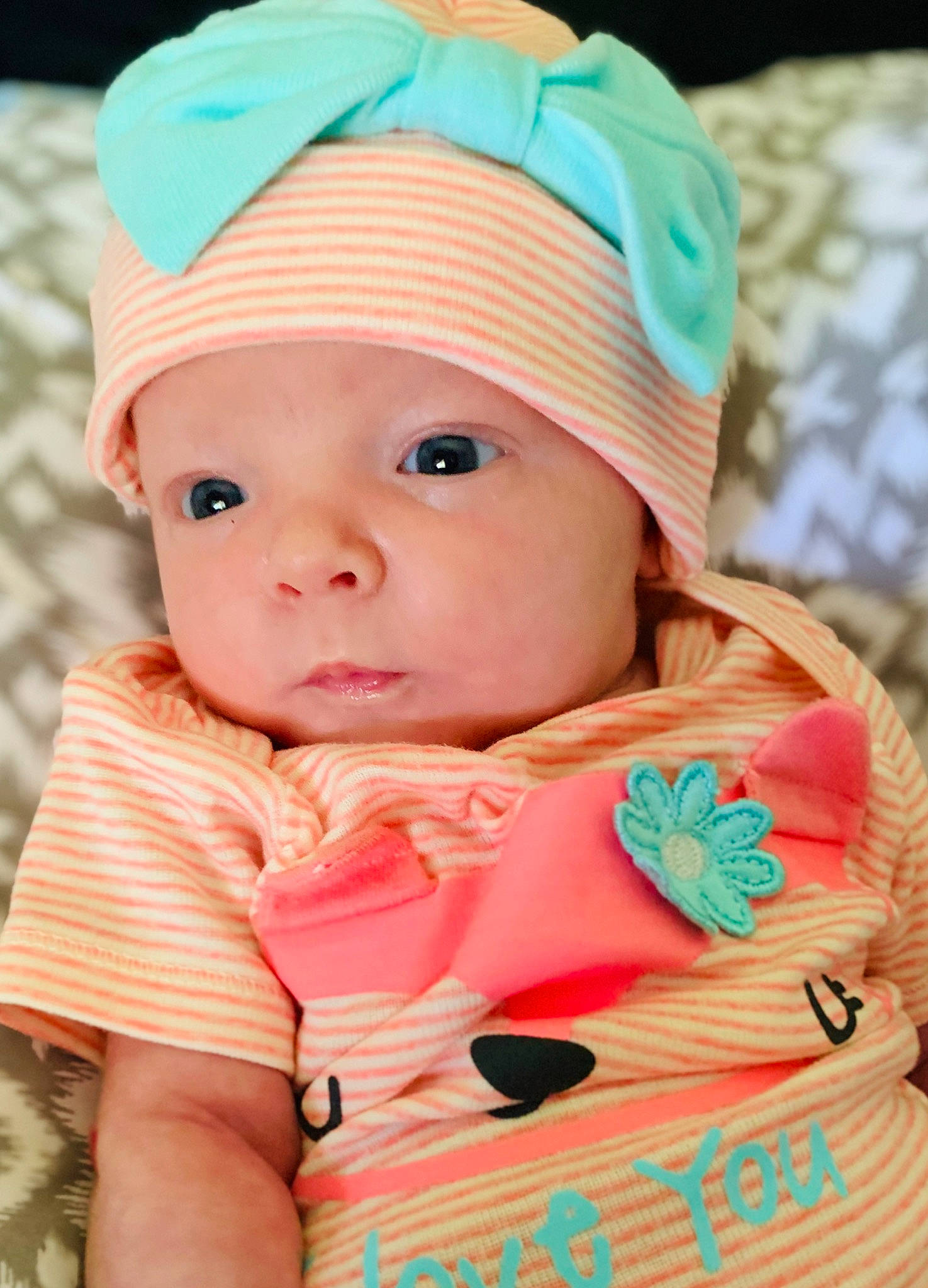 Cierra is registered to the contest to win money with this photo: baby, baby_toddler_clothing, beanie, bonnet, cap, child, clothing, fashion_accessory, hair_accessory, headgear, headwear, knit_cap, peach, person, pink, sun_hat, toddler