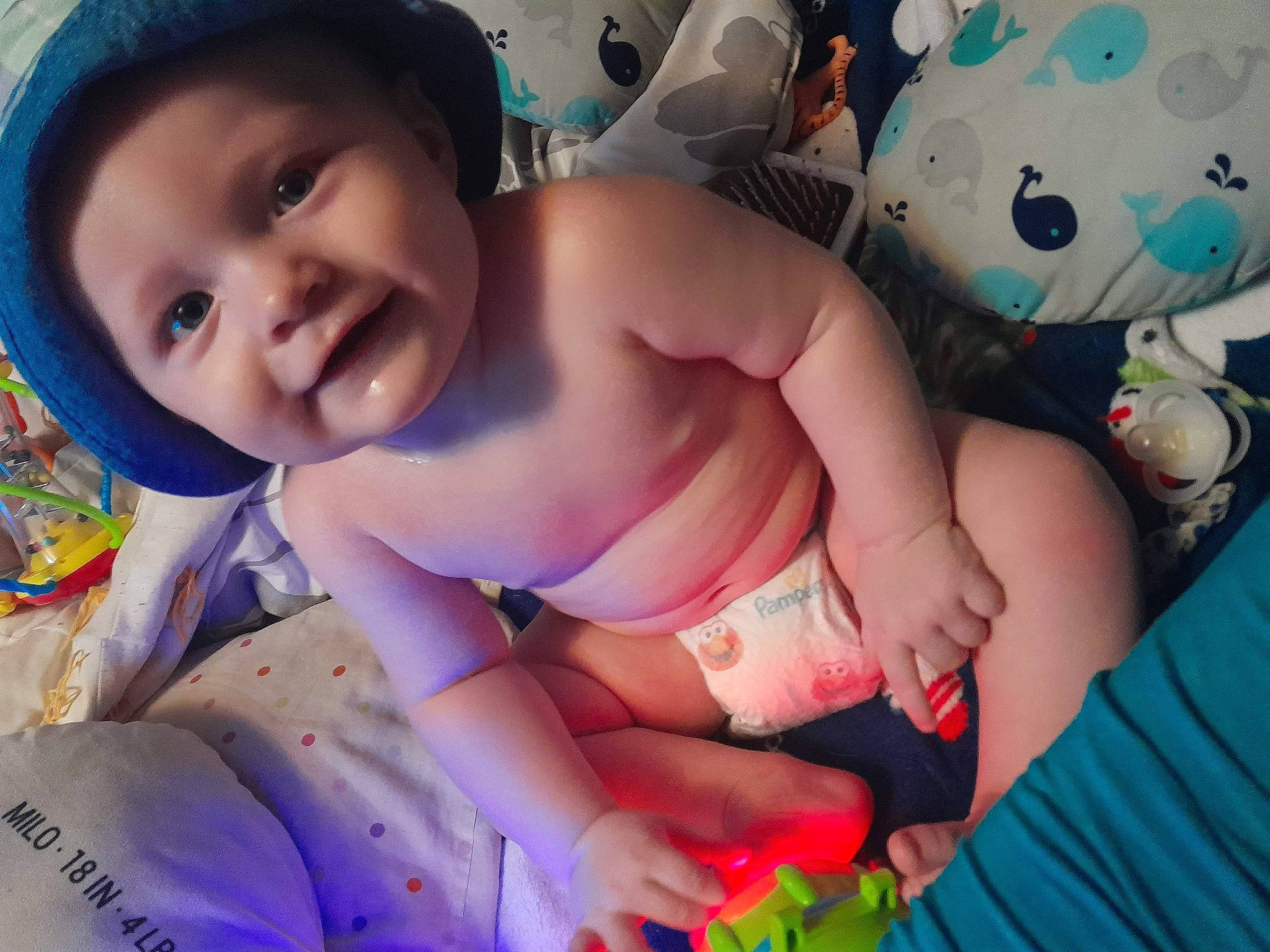 Dawson joined the competition — help win amazing prizes! abdomen, baby, baby_toddler_clothing, blue, cap, chest, child, event, face, fun, happy, hat, human_body, joy, leisure, mouth, pattern, person, pink, skin