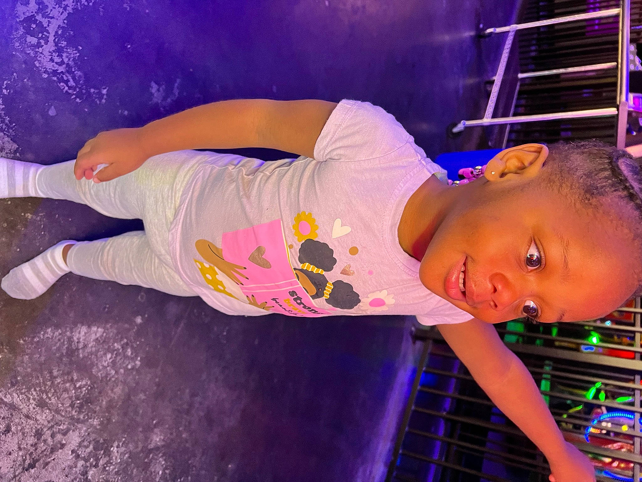 Beatrice is registered to the contest to win money with this photo: abdomen, chest, child, electric_blue, entertainment, flash_photography, fun, happy, human_leg, leisure, magenta, person, pink, plant, purple, thigh