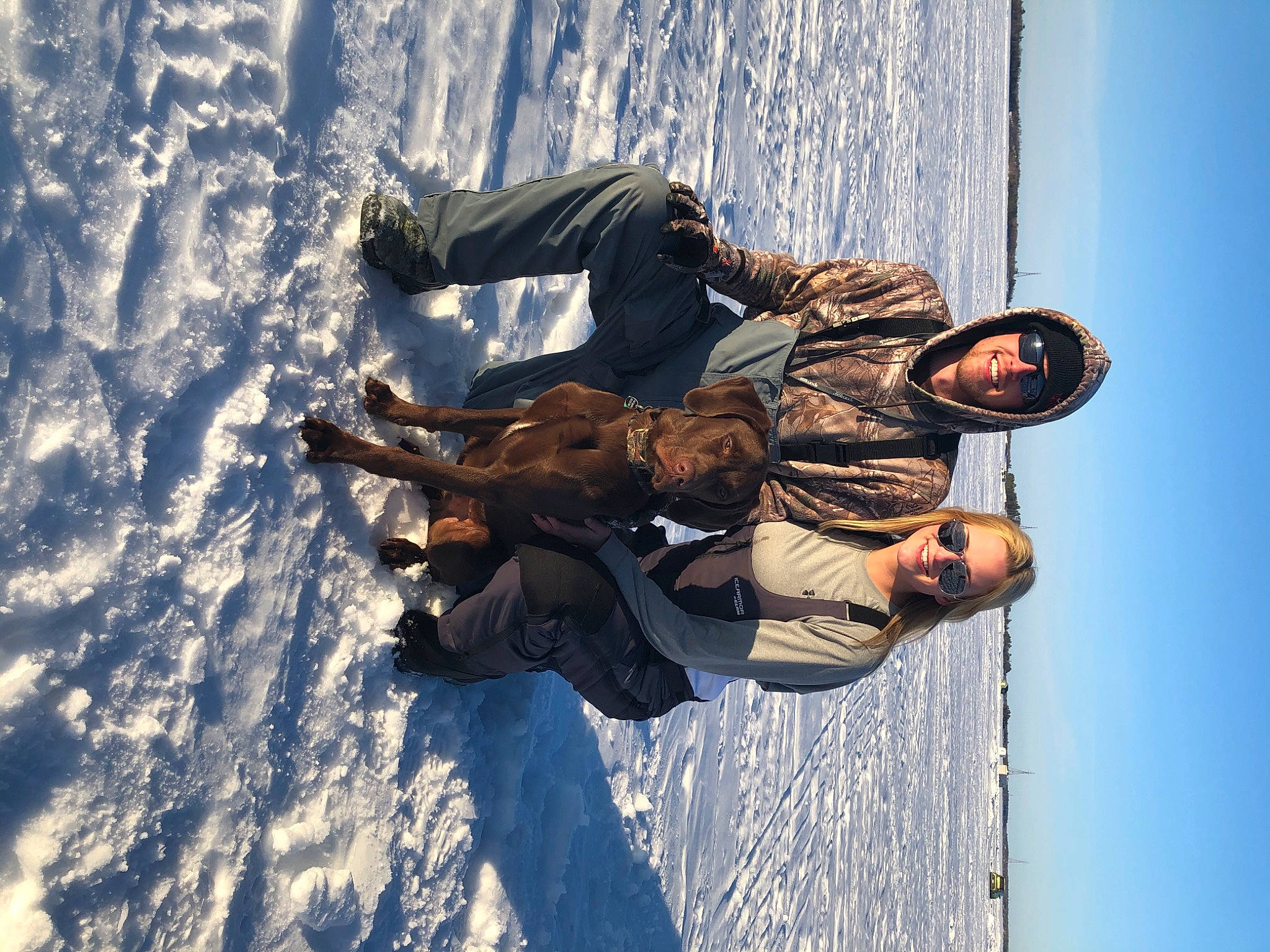 Fitzgerald joined the competition — help win amazing prizes! boot, elbow, freezing, fun, happy, human_body, leg, leisure, mammal, outdoor_shoe, people_in_nature, recreation, sky, smile, sneakers, snow, travel, tree, water, winter