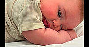 Henry is registered to the contest to win money with this photo: arm, baby, child, closeup, clothing, cute, expression, face, head, indoors, infant, newborn, peaceful, portrait, resting, skin, sleeping, soft, texture, white