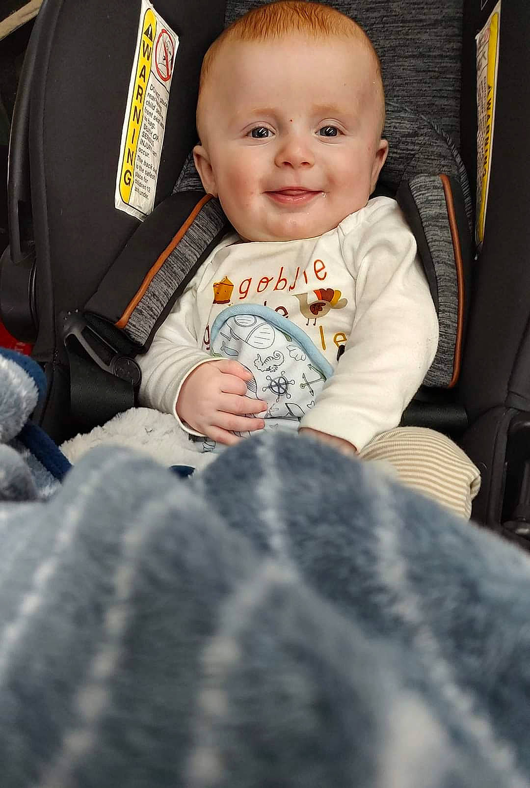 Lennon joined the competition — help win amazing prizes! auto_part, baby, baby_carriage, baby_in_car_seat, baby_toddler_clothing, car_seat, child, comfort, eye, facial_expression, fun, gesture, hairstyle, happy, iris, joy, motor_vehicle, person, sitting, skin