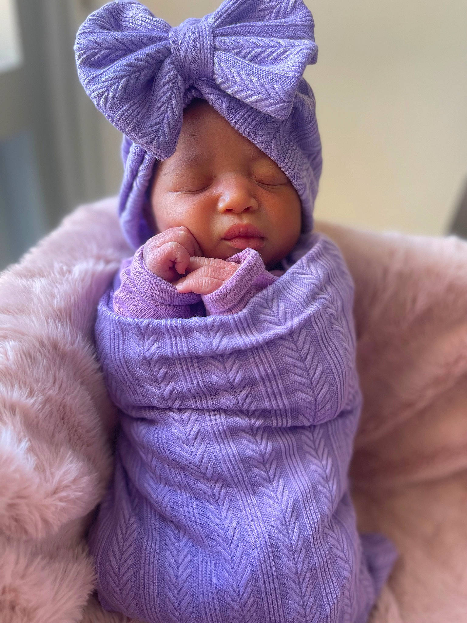 Jayani is registered to the contest to win money with this photo: baby, baby_sleeping, baby_toddler_clothing, blue, cap, cheek, child, comfort, face, headgear, headwear, knit_cap, magenta, person, pink, purple, sleeve, textile, toddler, violet