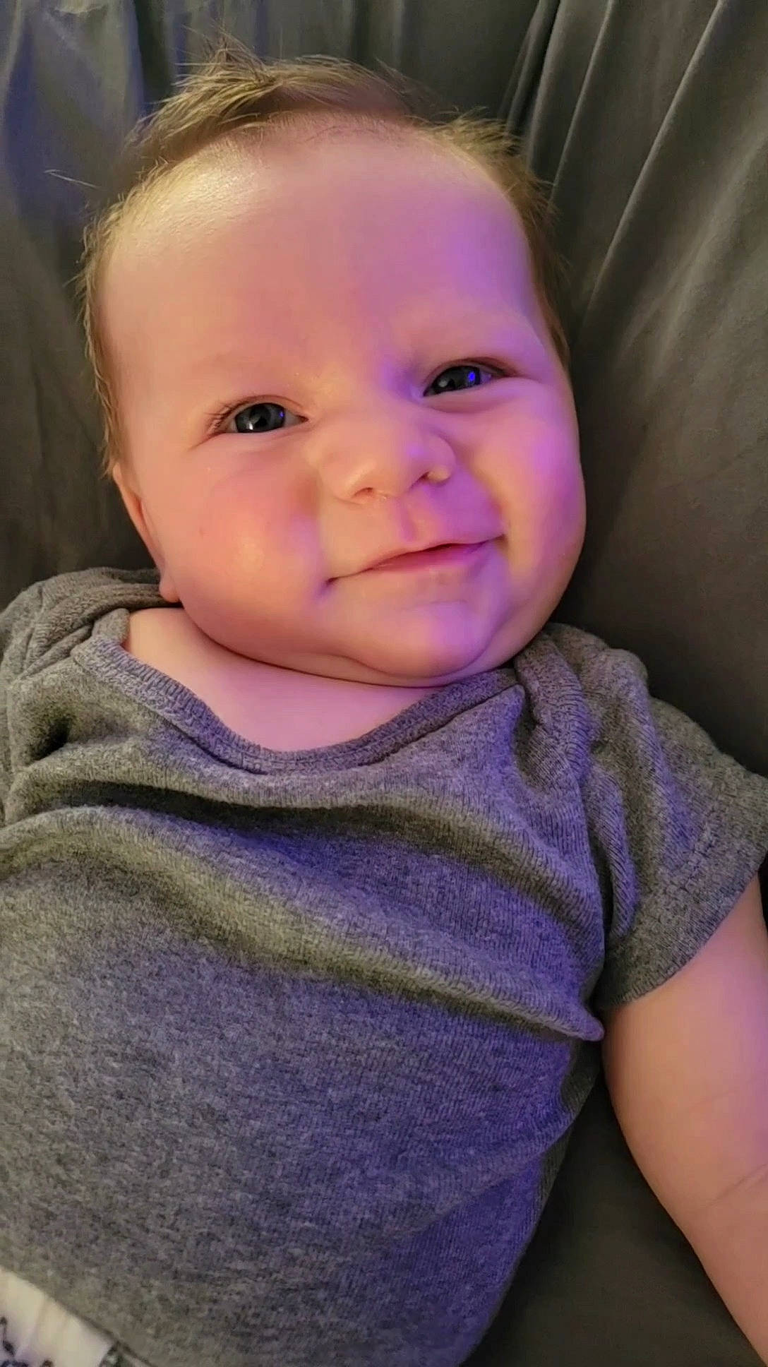 Cadence is registered to the contest to win money with this photo: baby, baby_toddler_clothing, cheek, ear, eye, eyebrow, eyelash, face, flash_photography, hair, happy, head, iris, lip, nose, person, purple, skin, sleeve, smile