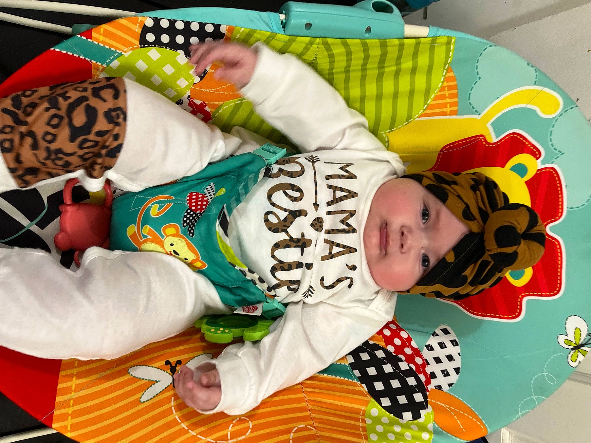 Lorelei is registered to the contest to win money with this photo: art, baby, baby_products, baby_toddler_clothing, baby_toys, child, comfort, entertainment, event, fun, green, happy, headwear, linens, pattern, person, play, playmat, room, sleeve