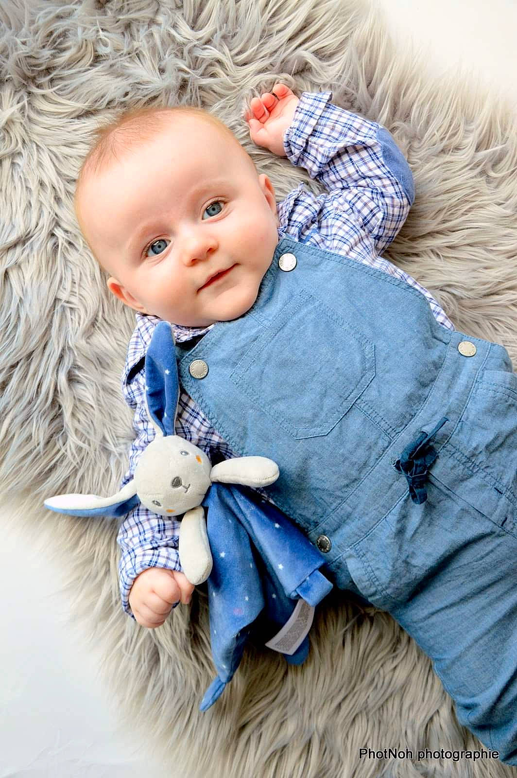 Marin participe au concours pour gagner de l'argent avec cette photo : azure, baby, baby_toddler_clothing, child, denim, doll, electric_blue, eye, face, grey, hair, head, iris, outerwear, person, product, skin, sleeve, textile, toddler