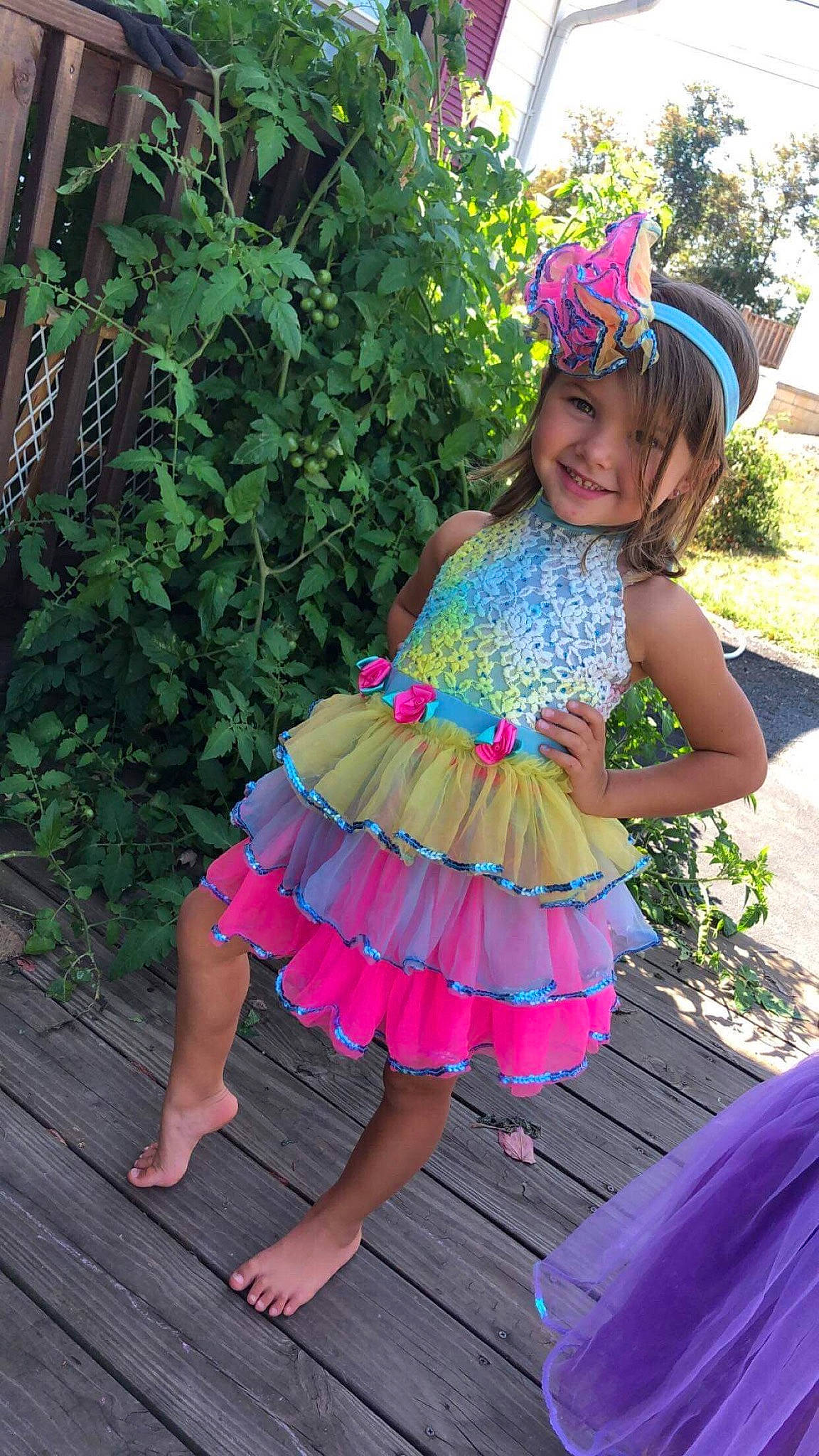 Zaila is registered to the contest to win money with this photo: baby_toddler_clothing, child, clothing, costume, dress, fashion_accessory, hair_accessory, headband, headwear, joy, magenta, party, person, pink, purple, ruffle, textile, toddler