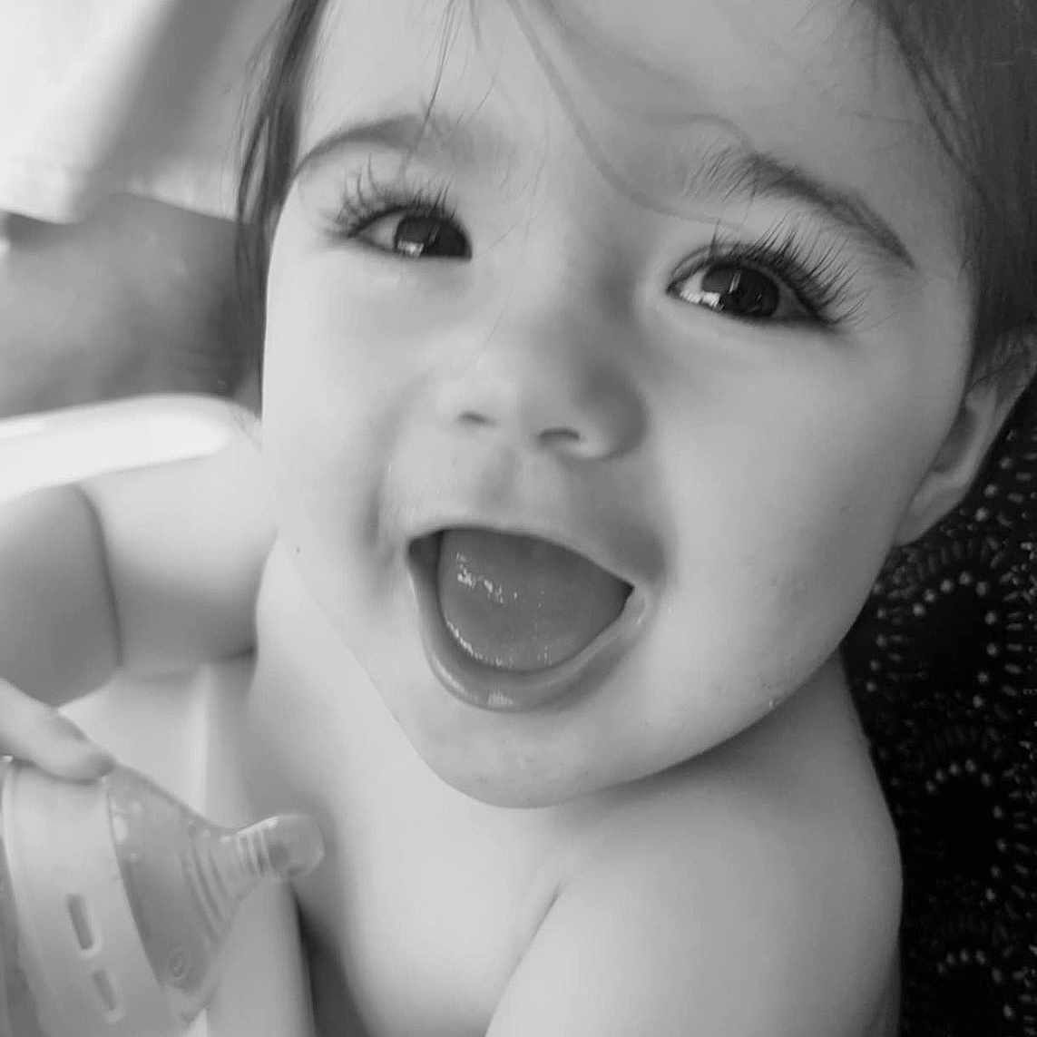 Symphony joined the competition — help win amazing prizes! baby, black_and_white, bottle, child, closeup, cute, expression, eyes, face, hair, hand, happy, high_chair, infant, mouth, person, portrait, skin, smiling, tongue