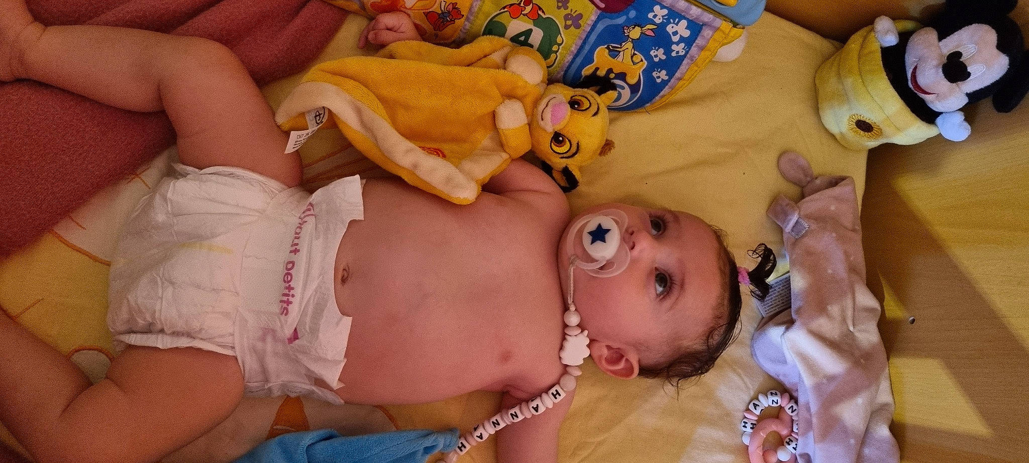 Hannah a rejoint le concours — aidez-le/la à gagner de superbes lots ! abdomen, baby, cheek, chest, child, eye, fun, happy, human_leg, mouth, nail, orange, person, skin, stomach, textile, thigh, thumb, toddler, toy