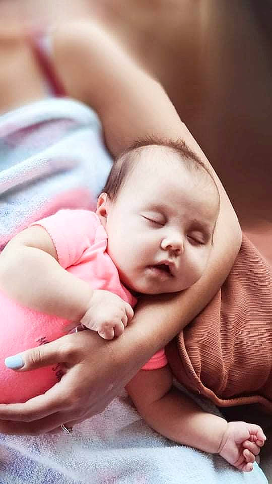 Evalynn Beverly Rae is registered to the contest to win money with this photo: baby, baby_sleeping, baby_toddler_clothing, cheek, child, chin, comfort, finger, flash_photography, gesture, happy, lip, mouth, nail, nose, person, pink, skin, thumb, toddler