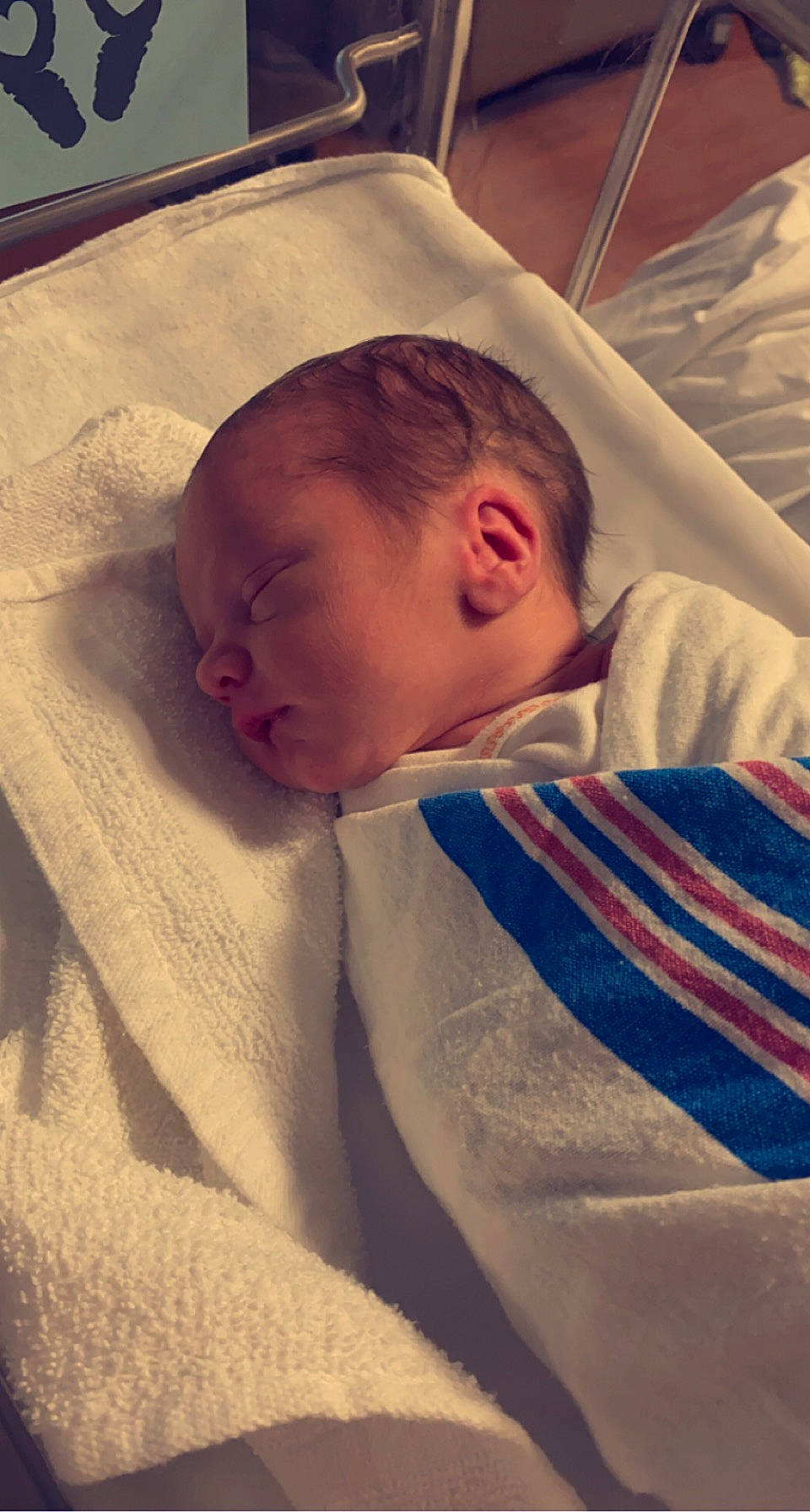 Zaelyn is registered to the contest to win money with this photo: baby, baby_sleeping, baby_toddler_clothing, bed, cheek, chin, comfort, eyebrow, facial_expression, head, human_body, linens, mammal, mouth, nose, person, skin, sleeve, textile, toddler