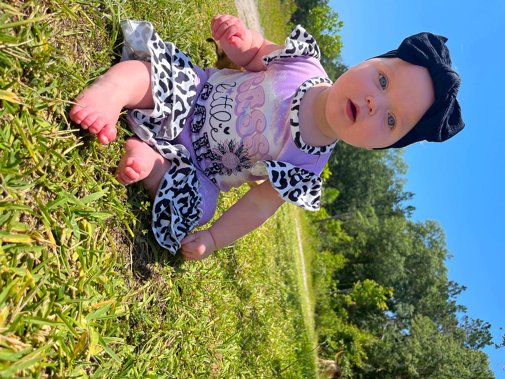 Adalynn is registered to the contest to win money with this photo: baseball_cap, child, electric_blue, fun, grass, happy, hat, headwear, leisure, light, people_in_nature, person, plant, recreation, sky, spring, summer, sun_hat, toddler, tree