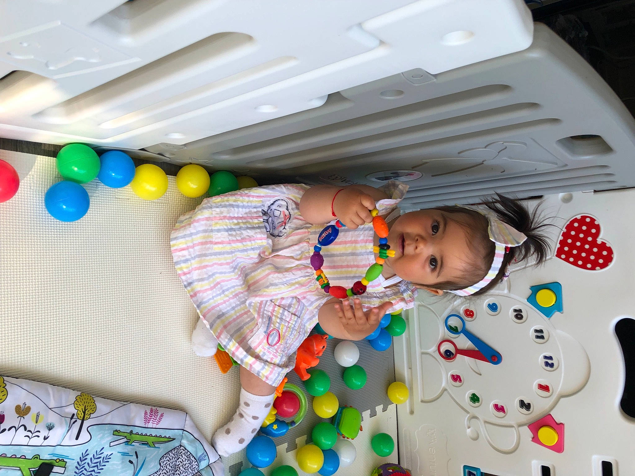 Macey is registered to the contest to win money with this photo: baby, baby_products, baby_toddler_clothing, baby_toys, balloon, child, event, fun, party, party_supply, pattern, person, play, product, room, stuffed_toy, sweetness, textile, toddler, toy