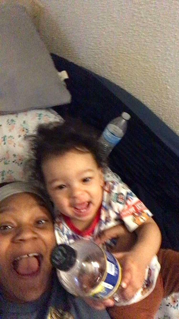 Jeremiah is registered to the contest to win money with this photo: car_seat, child, comfort, facial_expression, family_car, fun, gesture, happy, head, laugh, mouth, nose, person, selfie, skin, smile, thumb, toddler, travel, vacation