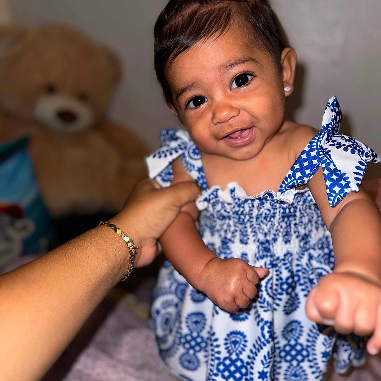 Ariella joined the competition — help win amazing prizes! accessories, baby, bodypart, bracelet, clothing, couch, dress, face, finger, furniture, hand, happy, head, jewelry, necklace, person, photography, portrait, sleeve, smile