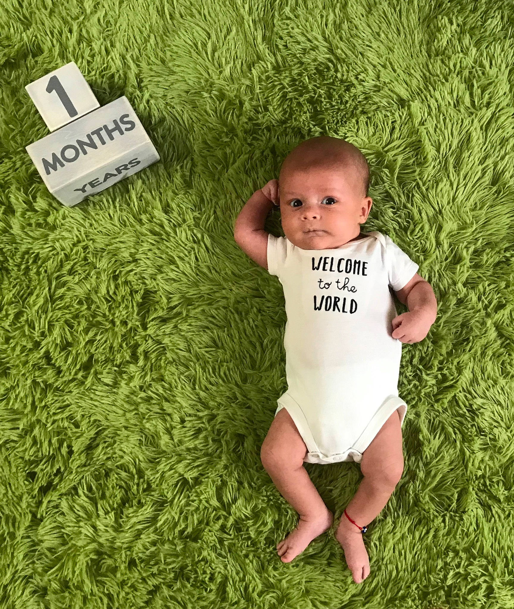 Bentley joined the competition — help win amazing prizes! adaptation, baby, baby_toddler_clothing, child, eye, face, fun, grass, grass_family, grassland, groundcover, happy, lawn, leisure, meadow, nature, people_in_nature, person, skin, t_shirt