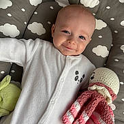 Ayden participe au concours pour gagner de l'argent avec cette photo : baby, smile, onesie, panda, crocheted_toy, octopus_toy, cloud_pattern, cushion, infant, child, cute, soft_toy, lying_down, happy, face, blue_eyes, cozy, fabric, plush, home