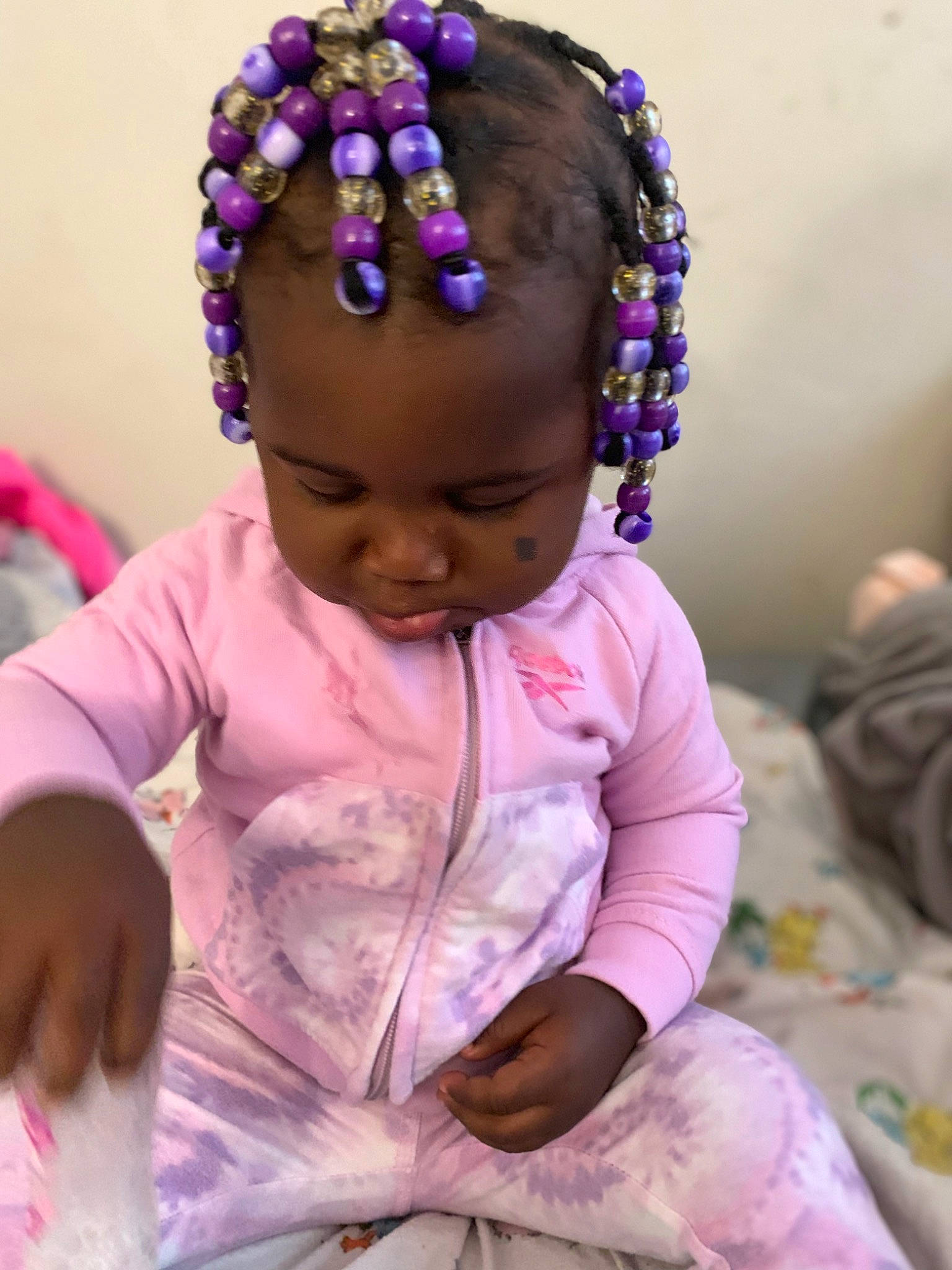 Araya is registered to the contest to win money with this photo: art, baby, baby_toddler_clothing, cheek, child, eye, face, facial_expression, fun, hairstyle, happy, head, headband, headpiece, magenta, person, pink, purple, skin, toddler