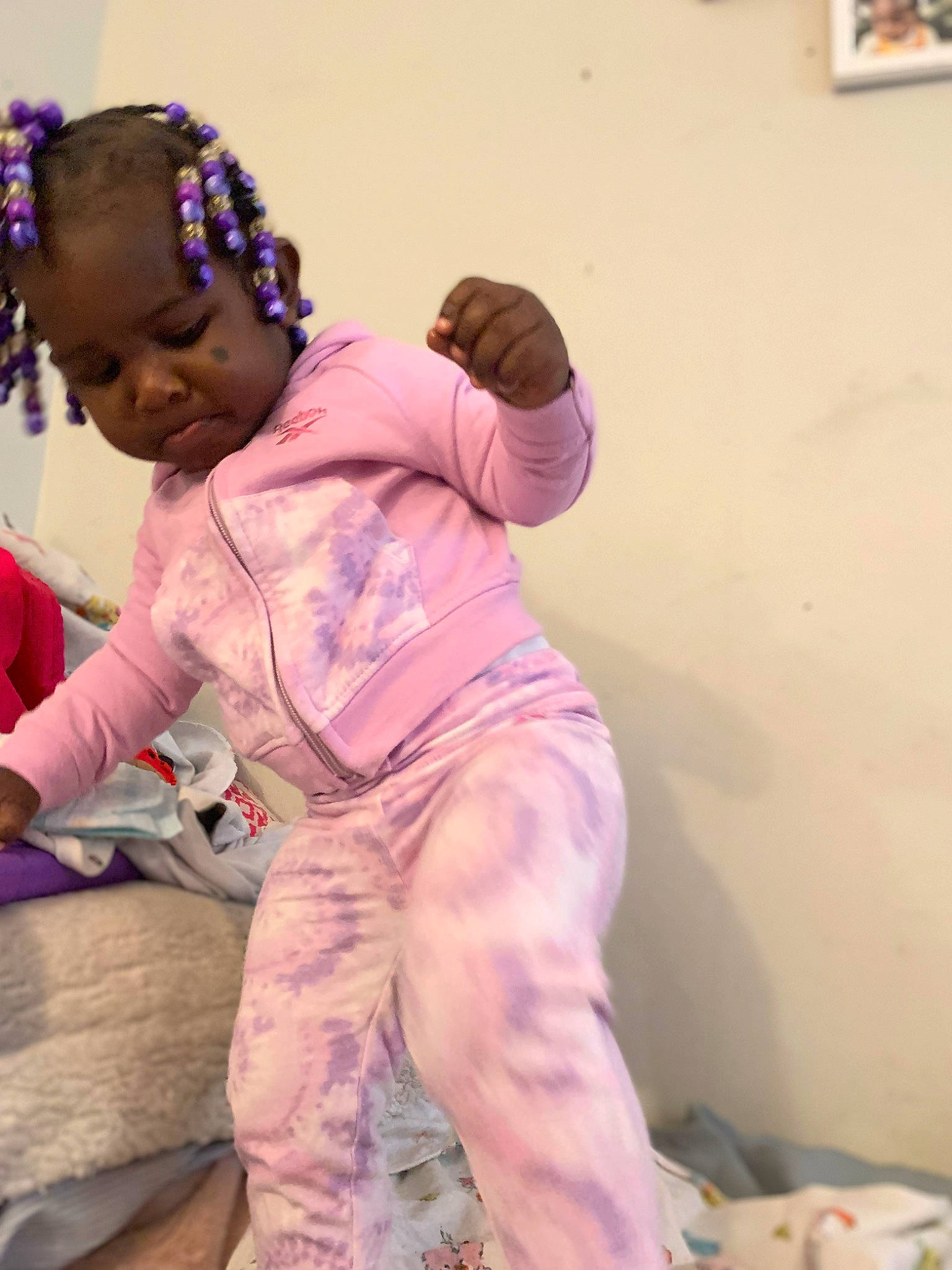 Araya joined the competition — help win amazing prizes! baby, baby_toddler_clothing, barefoot, child, entertainment, event, fun, happy, human_leg, knee, leisure, magenta, performing_arts, person, play, purple, room, sitting, sock, thigh