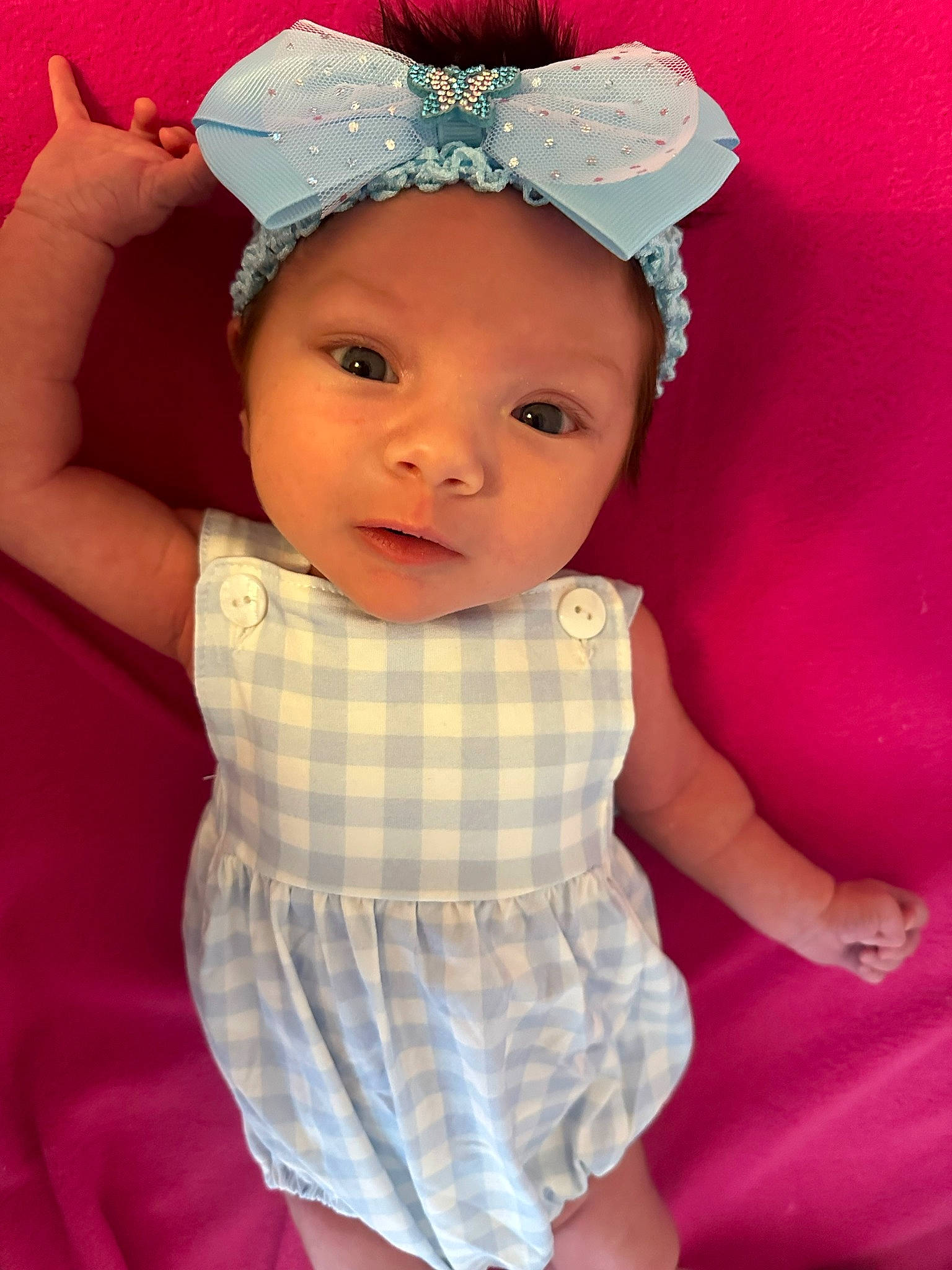 Aspen is registered to the contest to win money with this photo: baby, baby_toddler_clothing, cap, chin, eye, eyelash, face, fashion_accessory, happy, head, headband, headgear, headpiece, headwear, human_body, lip, person, pink, skin, sleeve