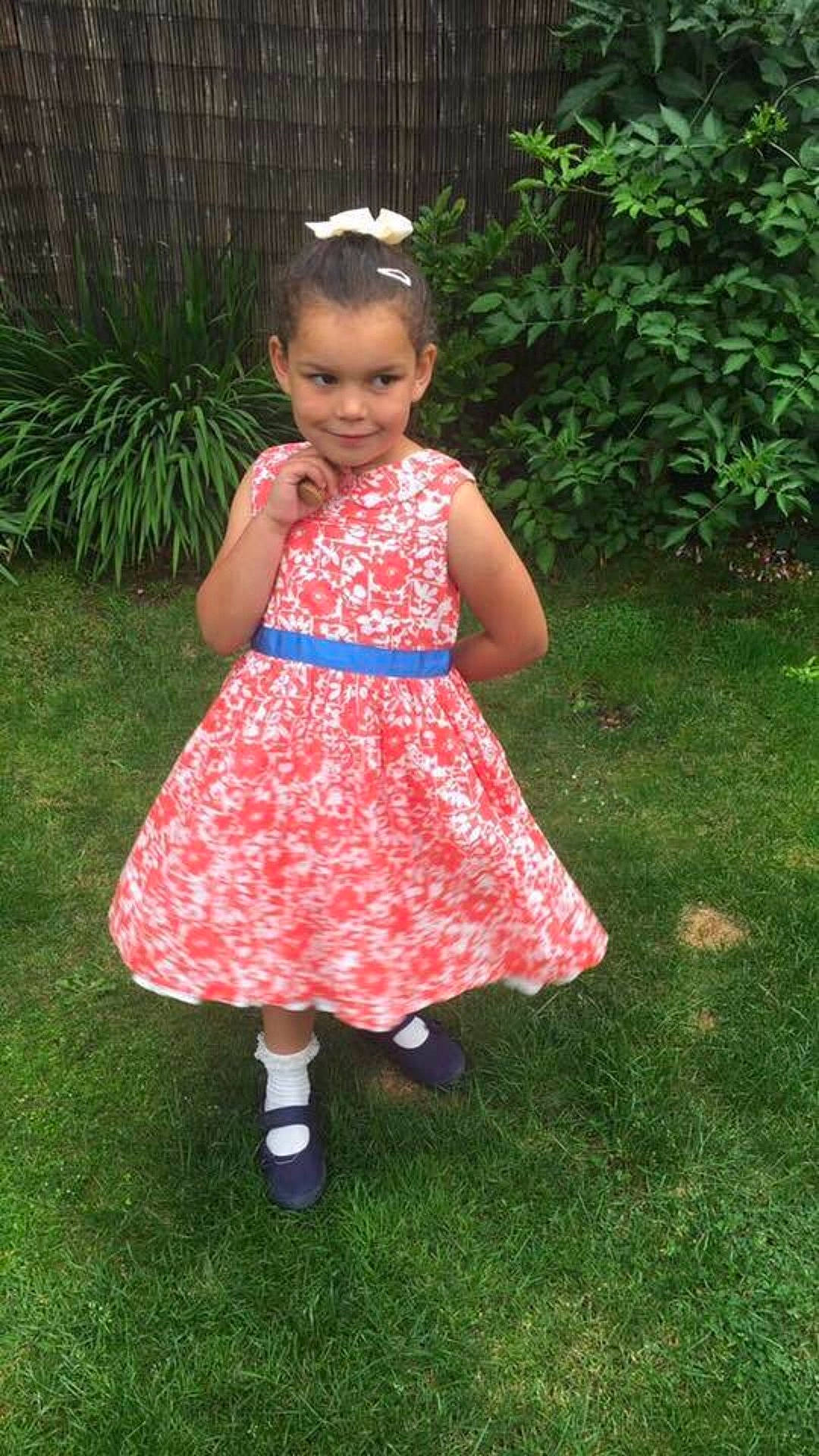 Summer-louise is registered to the contest to win money with this photo: child, clothing, dance_dress, day, design, dress, fun, girl, grass, joy, lawn, magenta, pattern, person, pink, play, polka_dot, summer, toddler