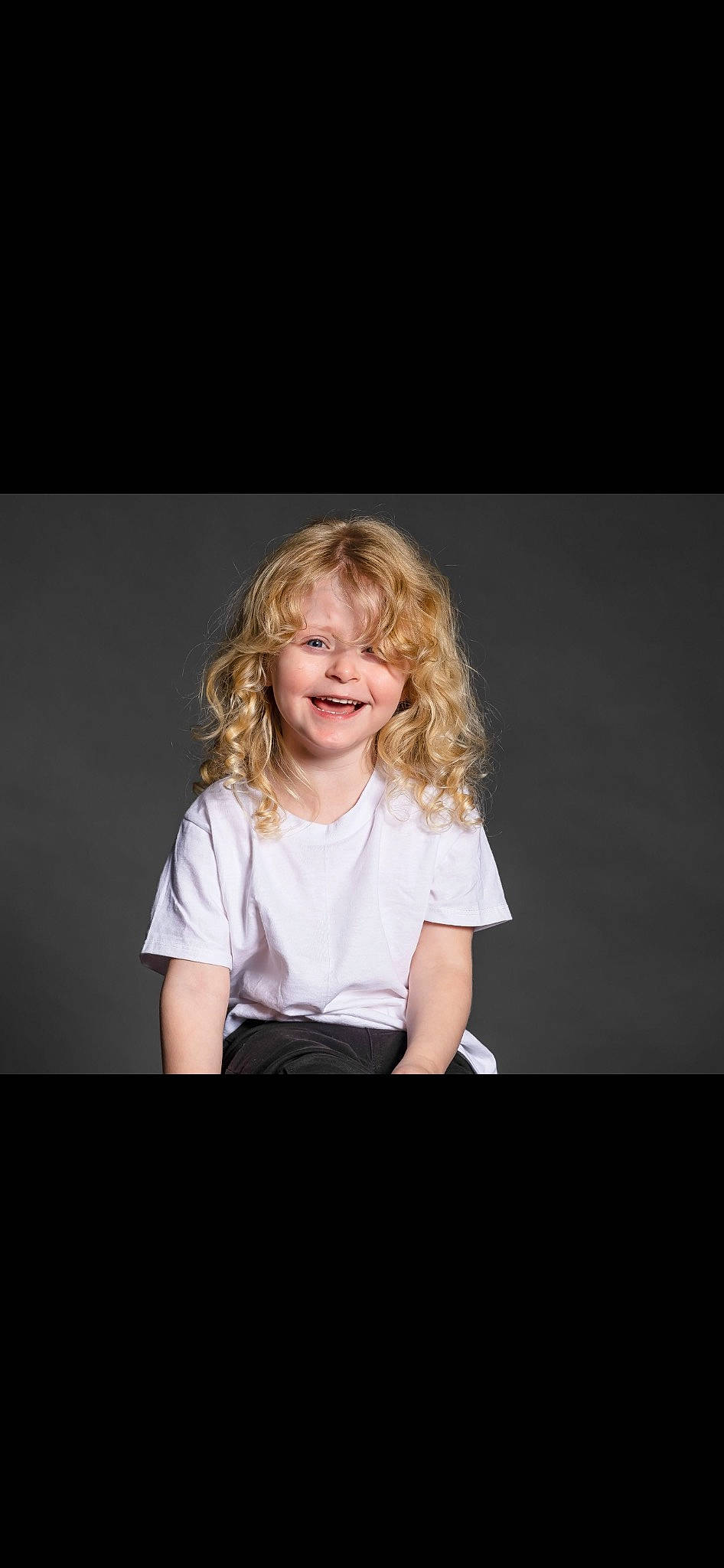 Journee is registered to the contest to win money with this photo: blond, brown_hair, cheek, child, darkness, electric_blue, event, fashion_design, flash_photography, formal_wear, fun, happy, joy, layered_hair, person, portrait_photography, sitting, sleeve, smile, step_cutting