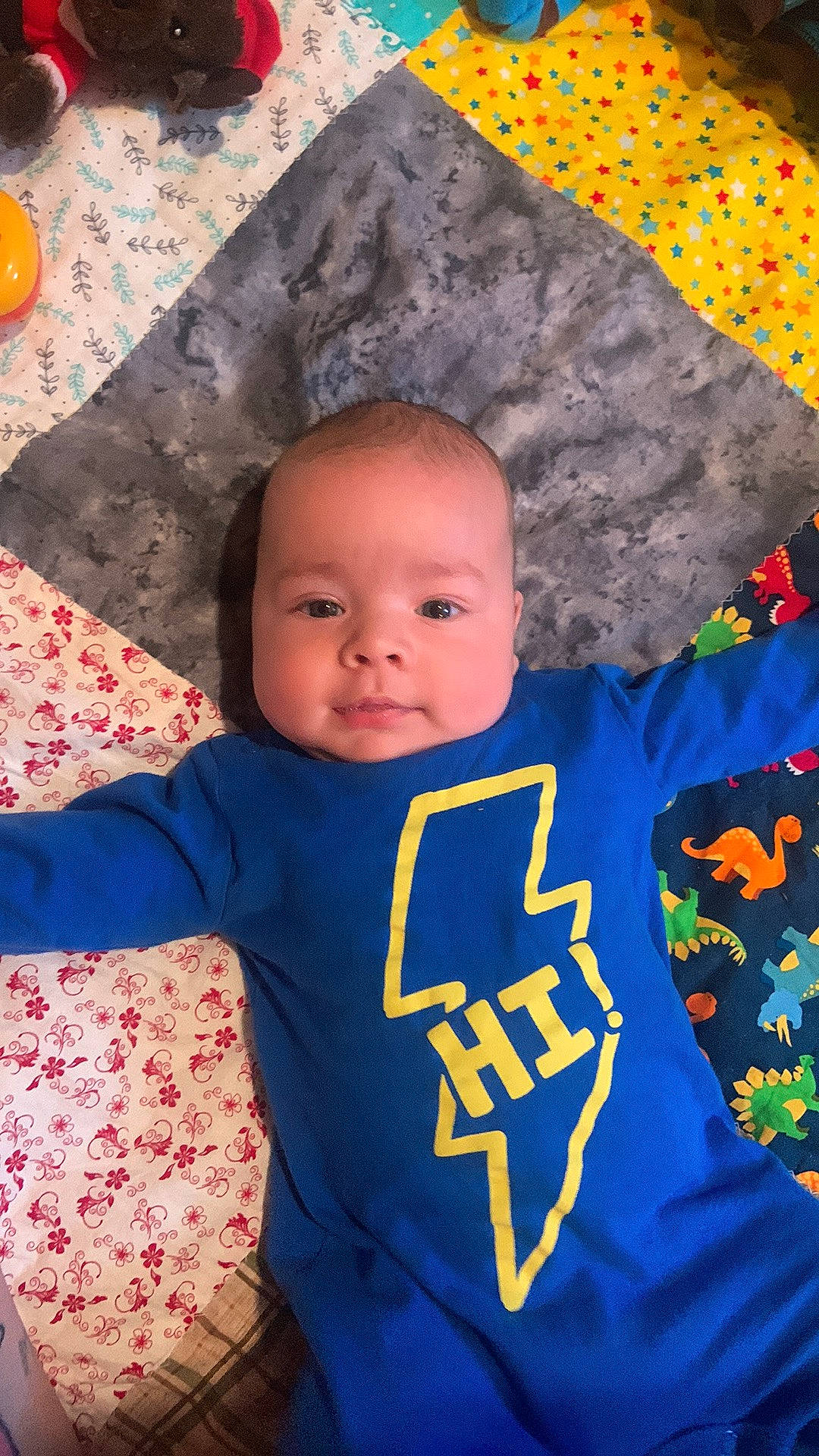 Joseph joined the competition — help win amazing prizes! baby, baby_toddler_clothing, cheek, child, electric_blue, eye, fun, happy, leisure, linens, orange, pattern, people, person, sleeve, smile, t_shirt, textile, toddler, vacation