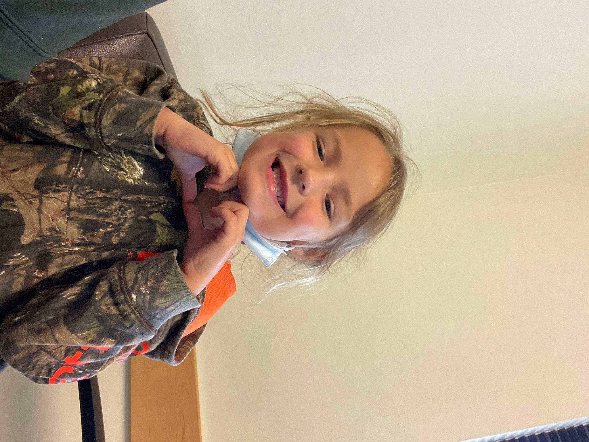 Brooklynn joined the competition — help win amazing prizes! blond, child, eye, eyelash, face, facial_expression, fashion_design, fun, gesture, happy, head, joy, long_hair, military_camouflage, nose, pattern, person, room, skin, smile