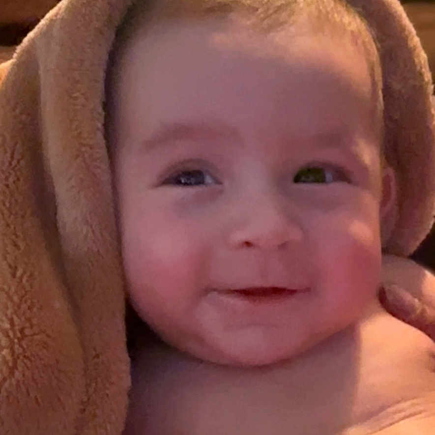 Michael Xavier Weems joined the competition — help win amazing prizes! baby, blanket, cheeks, child, closeup, comfort, cozy, cuddle, cute, expression, face, happy, head, infant, portrait, skin, smile, soft, warm, young