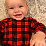 Jasper joined the competition — help win amazing prizes! baby, infant, child, smile, smiling, portrait, cute, lying_down, red_plaid, onesie, sleepwear, carpet, floor, home, cheerful, hand, eyes, head, skin, happy