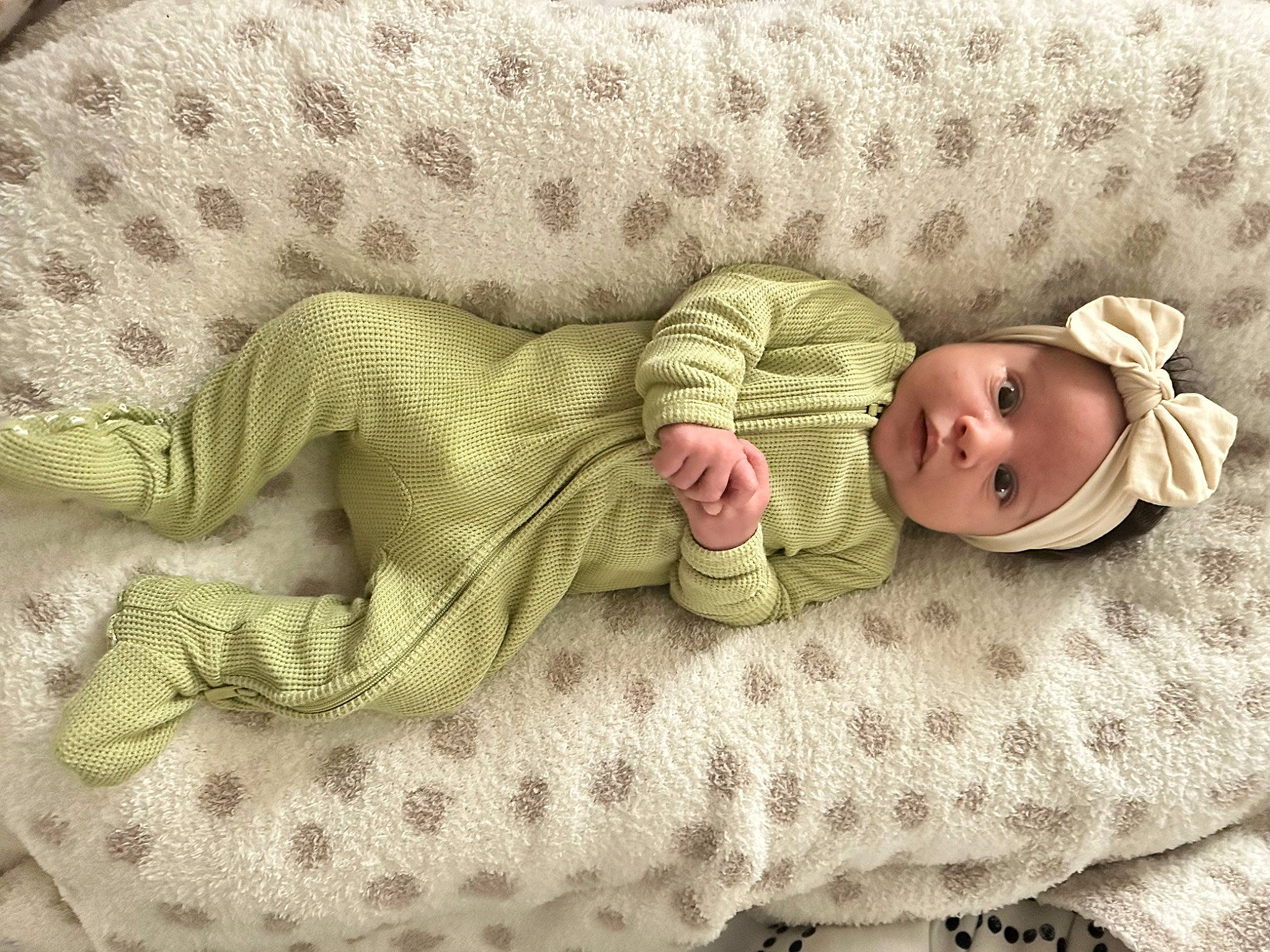 Emersyn is registered to the contest to win money with this photo: baby, baby_products, baby_safety, baby_sleeping, baby_toddler_clothing, bedding, bedtime, child, comfort, fur, headwear, linens, nap, pattern, person, room, sitting, skin, sleeve, textile