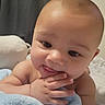 Ivan is registered to the contest to win money with this photo: baby, infant, child, blanket, hand, face, tongue, skin, eyes, indoor, curious, cute, expression, soft, cozy, closeup, portrait, sleepwear, baby_skin, newborn