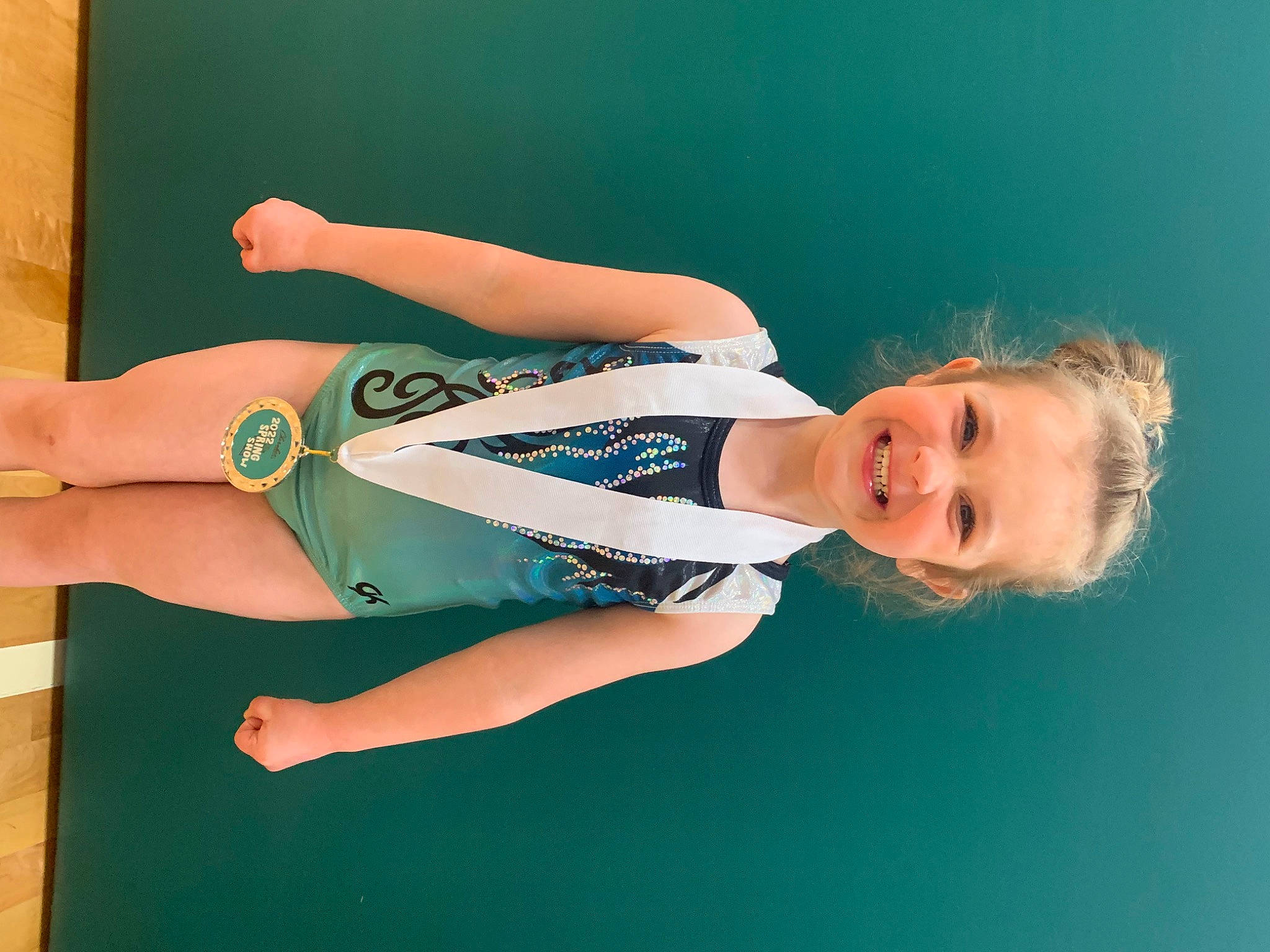 Kaia is registered to the contest to win money with this photo: balance, barefoot, blond, calf, dress, elbow, electric_blue, flash_photography, foot, fun, happy, human_body, human_leg, joy, knee, leg, person, smile, sportswear, thigh