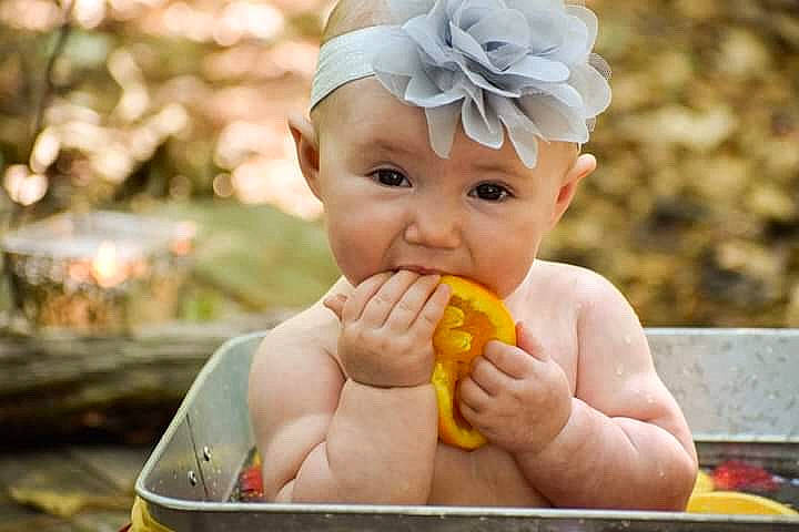 Faye is registered to the contest to win money with this photo: baby, baby_food, child, headwear, joy, person, toddler