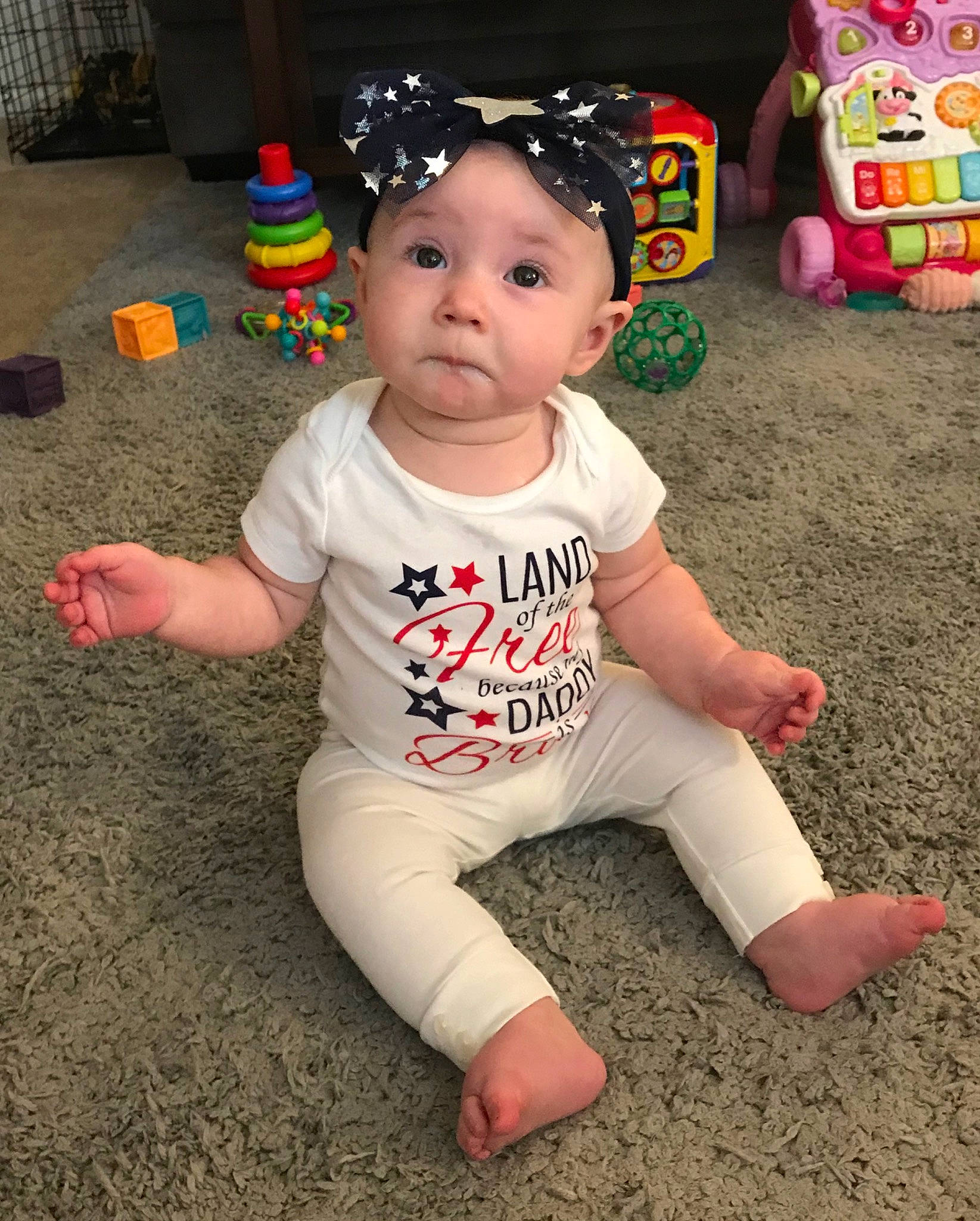 Faye is registered to the contest to win money with this photo: baby, baby_toddler_clothing, child, fun, person, play, sitting, toddler