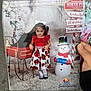 Isabella is registered to the contest to win money with this photo: baby, child, clothing, dress, face, female, footwear, girl, hat, head, nature, outdoors, person, photography, portrait, shoe, snow, snowman, toy, winter
