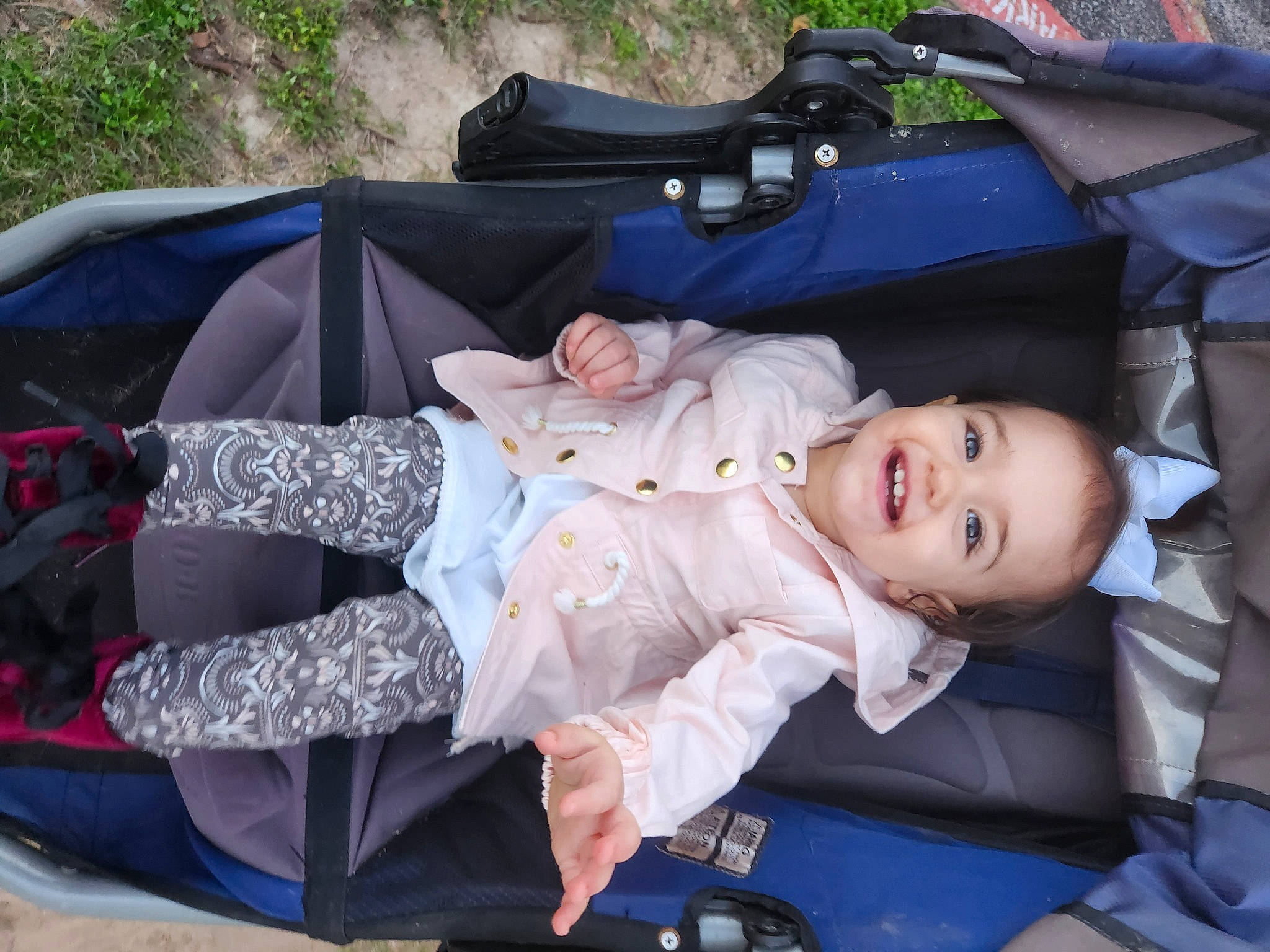 Mckinley joined the competition — help win amazing prizes! baby, baby_carriage, baby_products, baby_toddler_clothing, child, comfort, fun, grass, happy, joy, lap, person, product, sitting, smile, toddler, tree