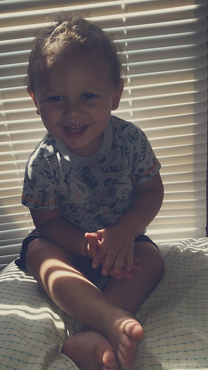 Jaxxon is registered to the contest to win money with this photo: arm, boy, child, cool, day, eye, fun, girl, human, joy, leg, person, sitting, skin, smile, standing, toddler