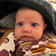 Maylin is registered to the contest to win money with this photo: baby, infant, face, eyes, blanket, clothing, closeup, expression, curious, portrait, child, indoors, warm, soft, cute, skin, head, newborn, wrapped, cozy