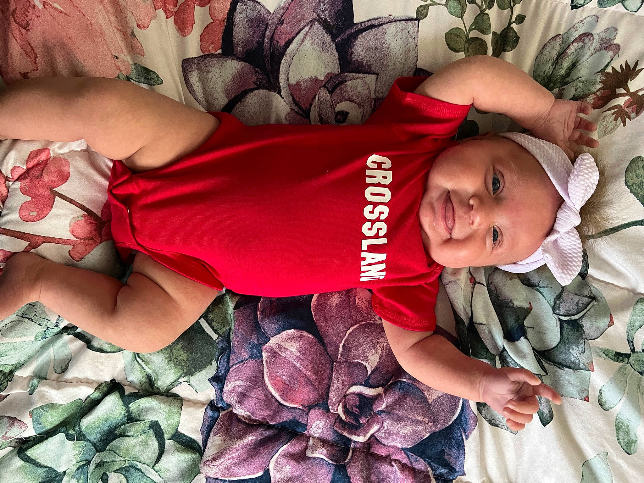 Oaklee is registered to the contest to win money with this photo: beauty, black_hair, cool, elbow, finger, happy, headwear, human_body, human_leg, knee, leg, magenta, mouth, pattern, person, photograph, pink, skin, smile, snapshot