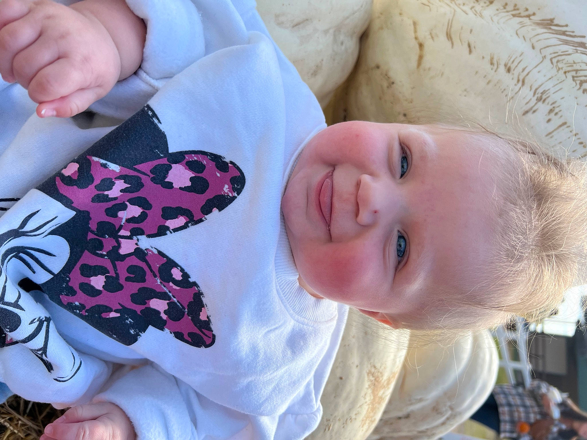 Oaklee is registered to the contest to win money with this photo: baby, baby_toddler_clothing, butterfly, child, finger, happy, hat, headgear, insect, joy, mammal, moths_and_butterflies, nail, pattern, person, pollinator, product, skin, smile, sun_hat