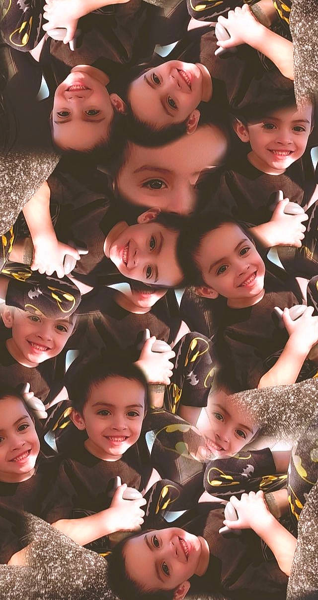 Izik is registered to the contest to win money with this photo: art, child, event, fun, headwear, joy, people, person, smile, social_group, team